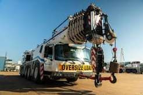 All-terrain crane truck marked oversize load
